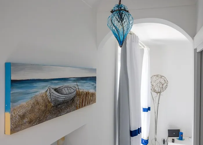 Blue Waves - De Vivo Realty